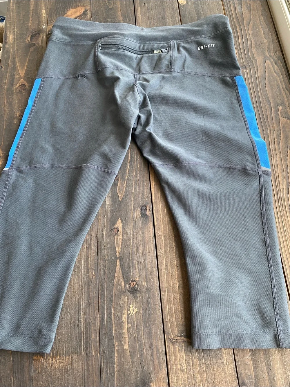 Nike Gray Capri Leggings with Bright Blue Side Panels